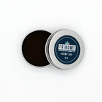 Baume CBD Trikome 20 ml ouvert au format carré, texture visible et packaging minimal sur fond blanc.